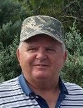 Tom E. Baney