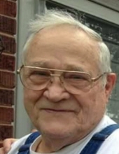 Kenneth J Miles