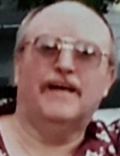 Norman G West