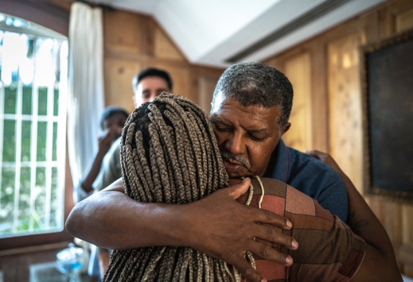 memorial service and families consoling each other