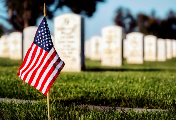 U.S. flag at cemetery conveying cemetery etiquette