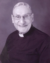 Rev. Robert E. Beckman, S.J.