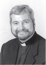 Rev. Michael A. Evans, S.J.