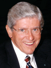 Kenneth E. Mueller