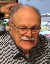 John E. Kremer
