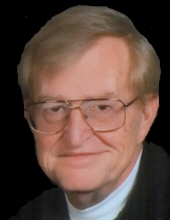 John E. Tackett