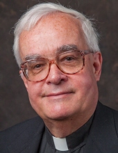 Rev. Philip  R. Amidon, S.J.