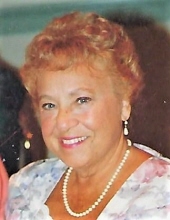 Carmella R. Scola