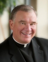 The Reverend Monsignor Michael L. Burke