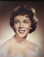 Margo J Adams