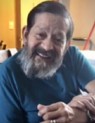 John E. Olguin