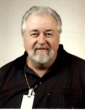 Kenneth E. Neumann