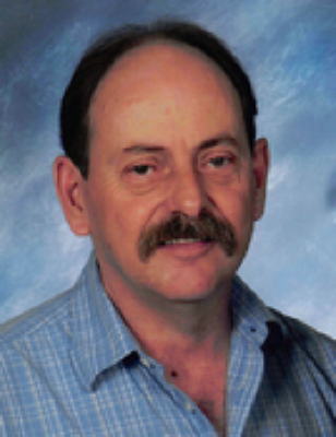 Daniel E Moore