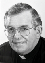 Reverend Monsignor Raymond F. Begin