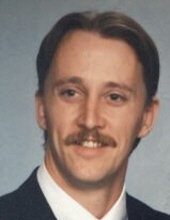 Mark E. Christensen