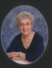 Barbara J Budner