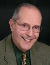 John E. Scheub, MD