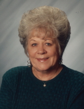 Joan M.  Curran