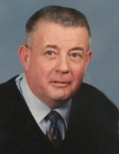 John E. Ackerson
