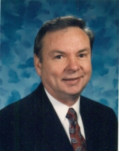 Ronald E.  Curry