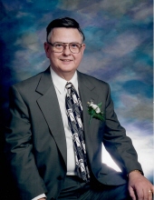 Dennis E. Whelton