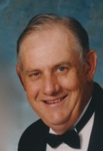 Joel  E. Dugan