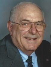 Norman E.  Miller