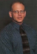 Dr. Thomas J. Olach