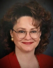 Tamela "Tami" E. Carroll