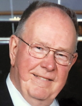 Ralph  E. Helstrom
