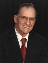 Raymond E. Emminger