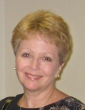 Christina E.  Tebbe