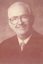 ROBERT J. GROGAN