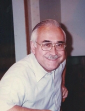 Dr. George E. Vezina