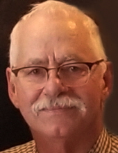 Gary L.  Koecher