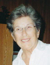 Caroline M. Veserat