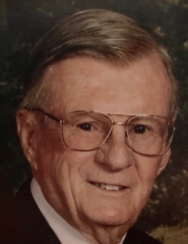 Clarence A "Tom" Moores